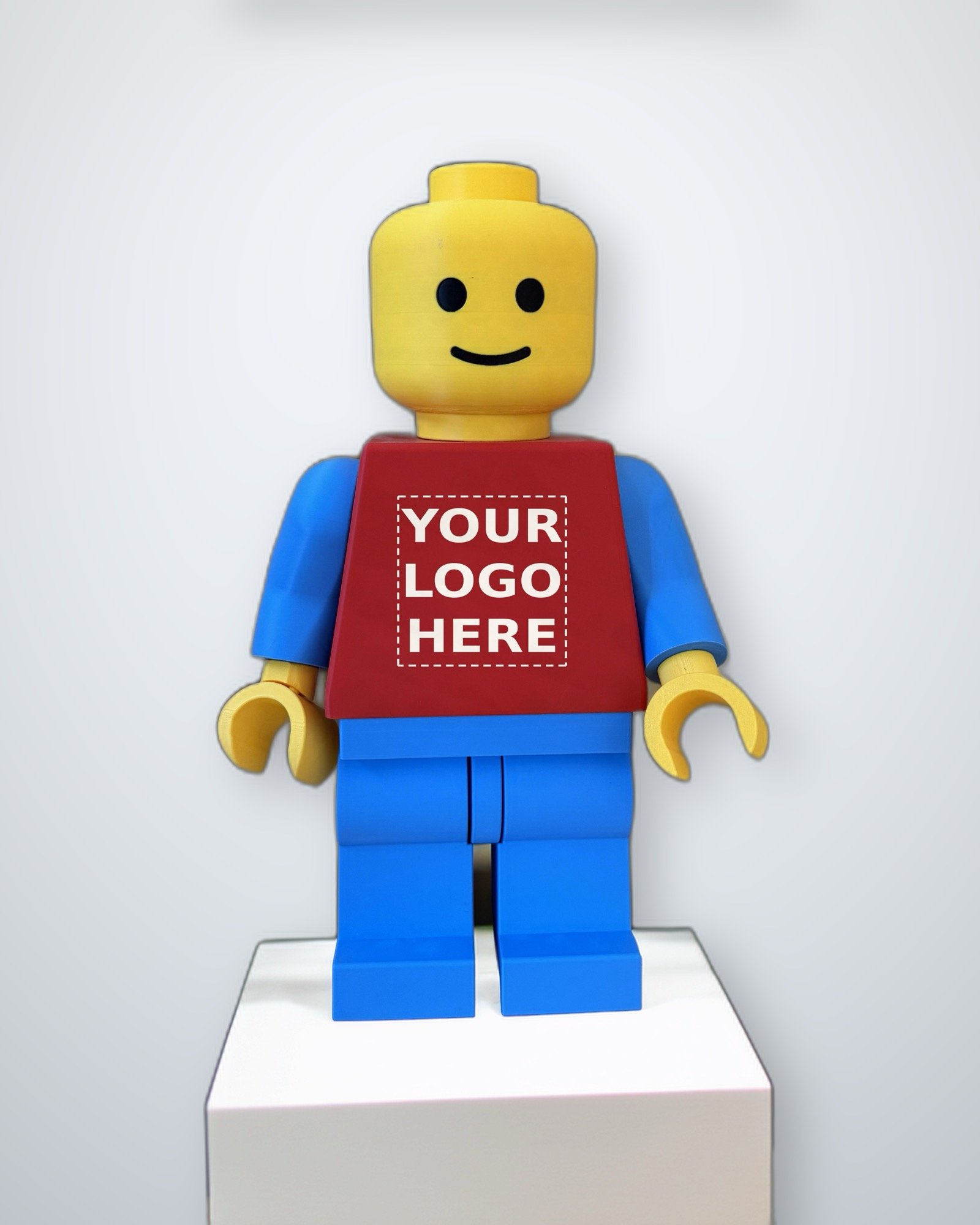 Mega Figure with a blank torso panel marked Your Logo Here, ready for a custom company logo commission