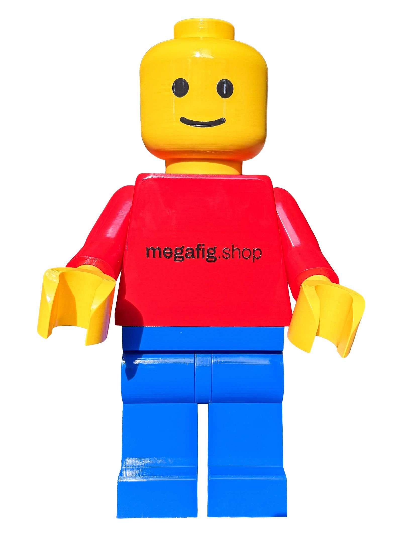 The Classic Mega Figure in high gloss — yellow head, red torso carrying the megafig.shop logo, cobalt legs — photographed against white